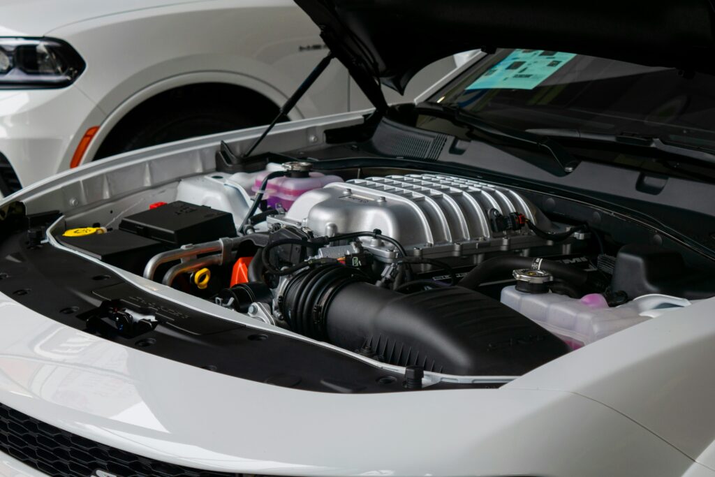 low VOC adhesive tape for automotive interiors